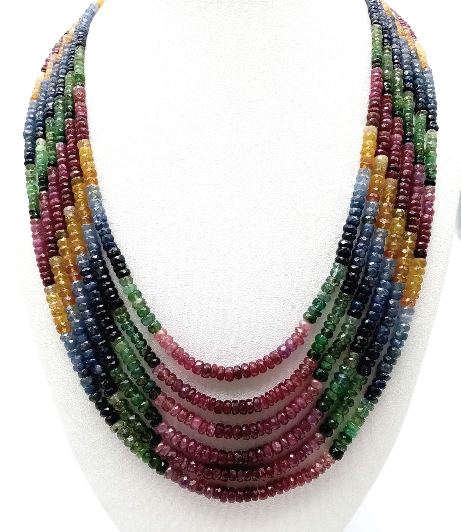 A fabulous 420ctw Ruby, Emerald and Sapphire multi-strain necklace with Asian embroidered