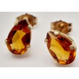 A Pair of 10K Yellow Gold Citrine Earrings. 0.75g total weight.