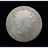 An 1820 George III Silver Crown Coin. F+ grade but please see photos.