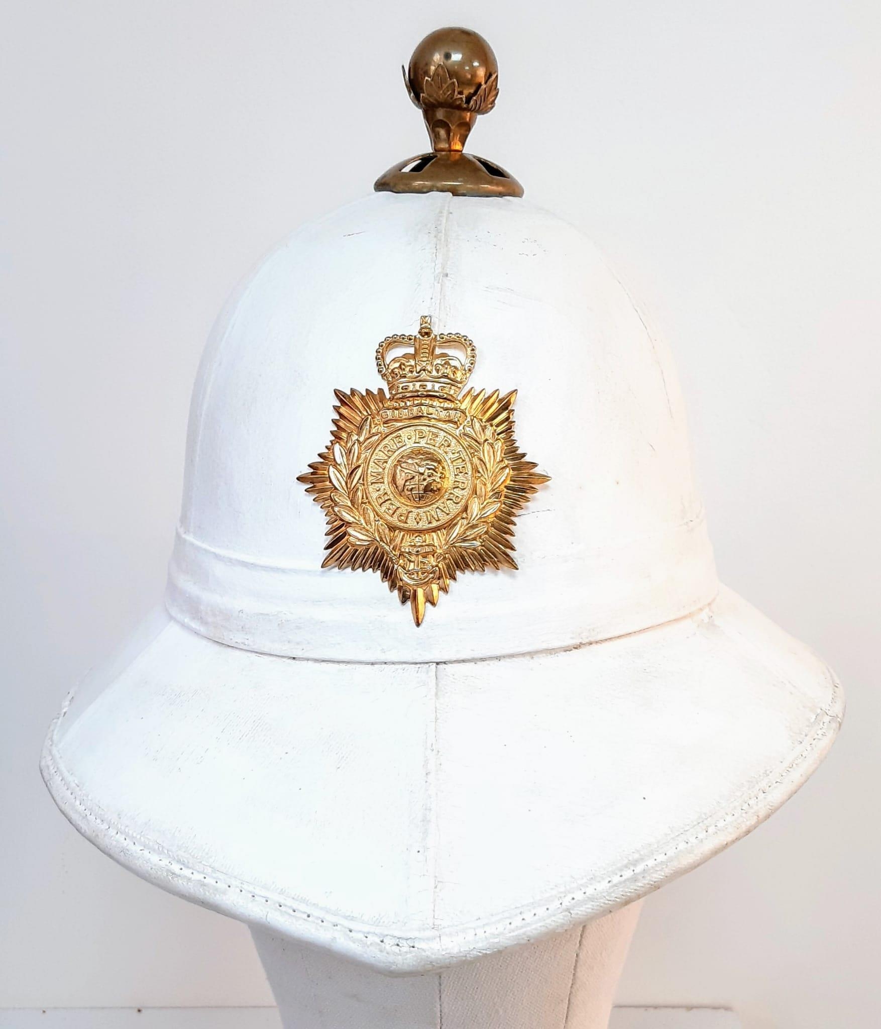 Royal Marines Band Other Ranks Wolseley Pith Helmet with Badge of Queen Elizabeth II (1952-2022).