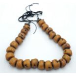 An African Tribal Berber Amber Resin Rondelle Necklace. 60cm.