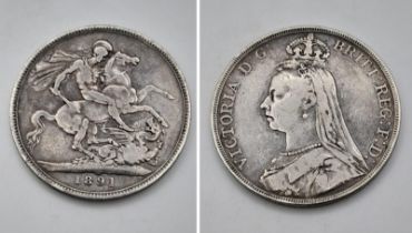 An 1891 Queen Victoria Silver Crown Coin. VF grade but please see photos.