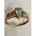 Stunning 9 carat GOLD and AQUAMARINE RING, having a lovely PEAR CUT AQUAMARINE with DIAMOND detail
