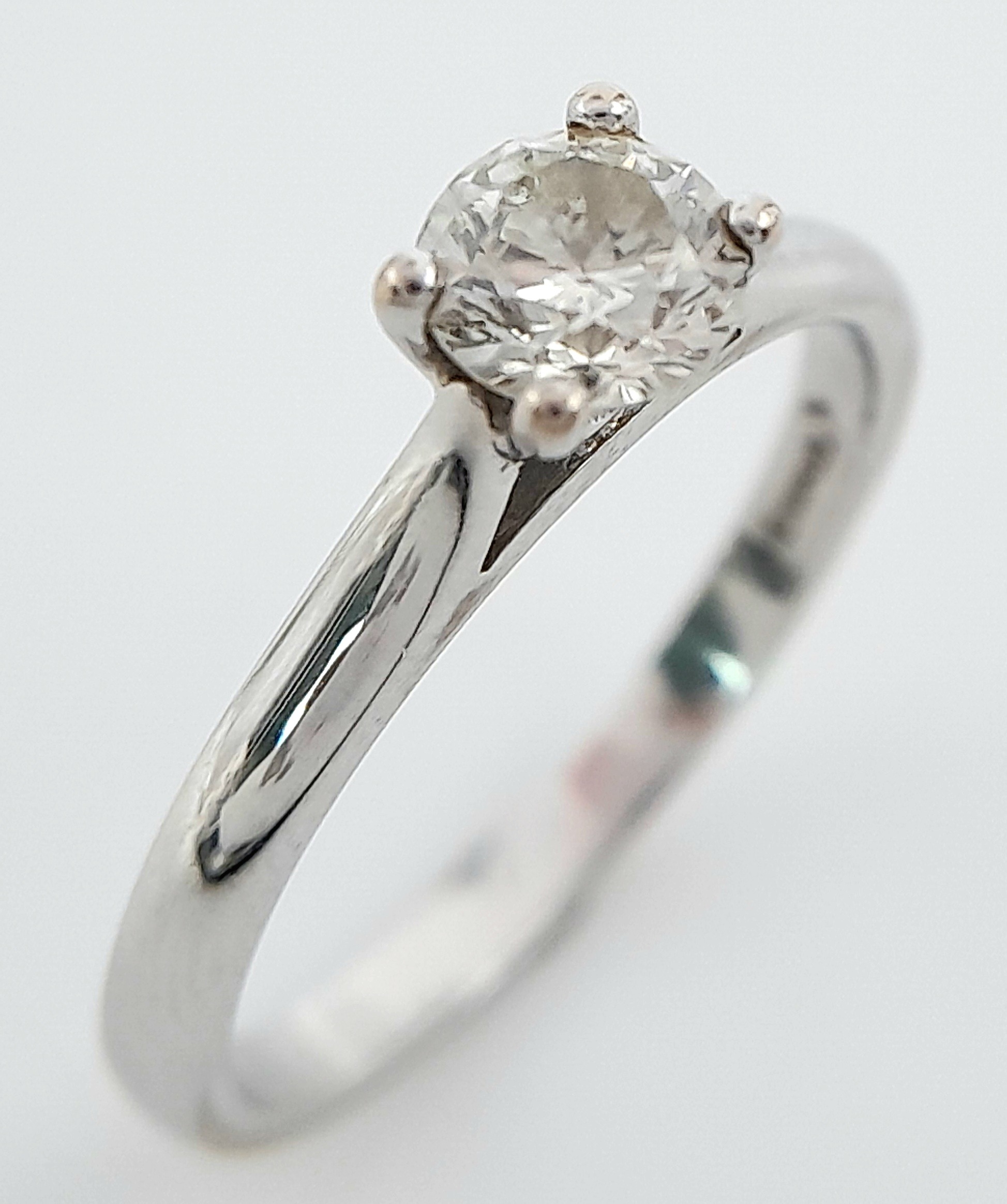 An 18K White Gold Diamond Solitaire Ring. 0.50ct brilliant round cut, slightly tinted. Size N. 2. - Image 3 of 6