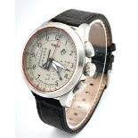 A Timex Intelligent Chronograph Quartz Gents Watch. Brown leather strap. Stainless steel case -