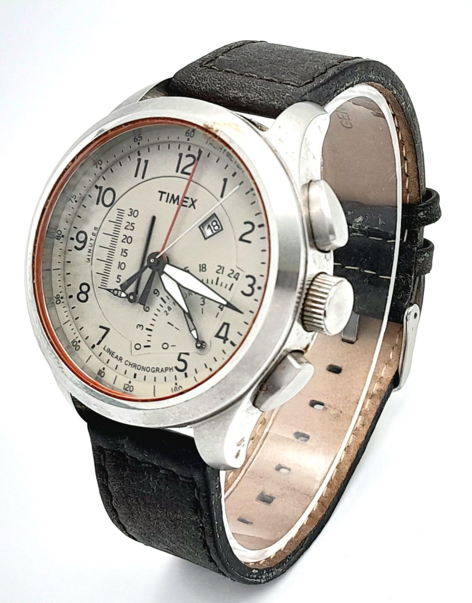 A Timex Intelligent Chronograph Quartz Gents Watch. Brown leather strap. Stainless steel case -