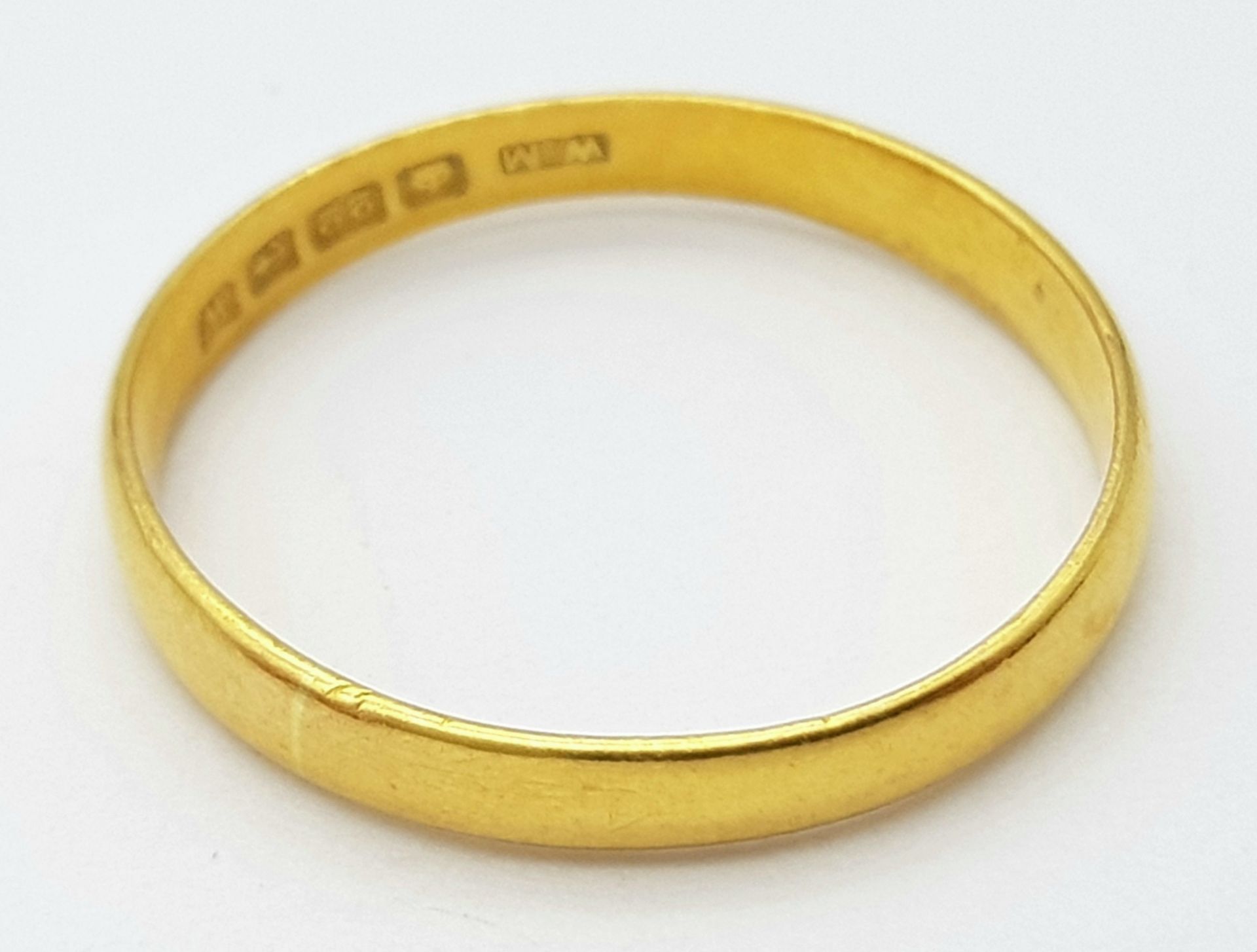 A 22 K yellow gold convex band ring, size: O, weight: 2.4 g. - Image 3 of 4