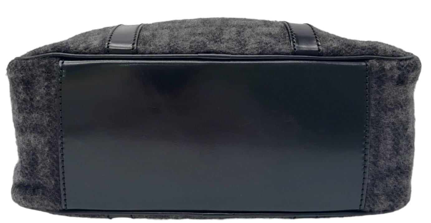 A Fendi Black and Charcoal Grey Bag. Textile exterior with black leather handles, silver-toned - Image 4 of 9