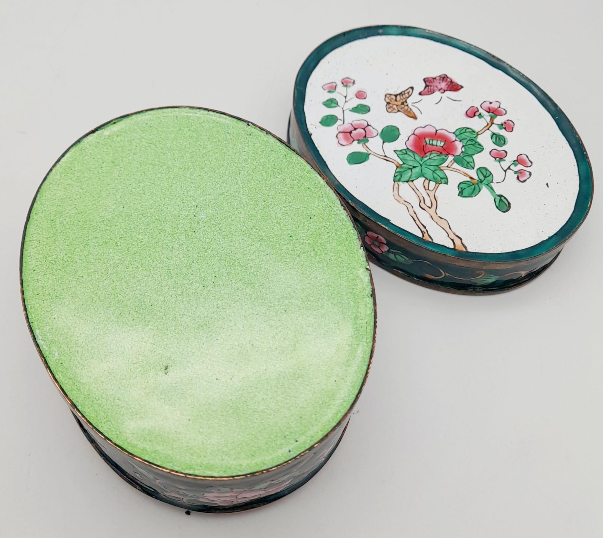 An Antique Chinese Canton Oval Enamel Box. Hand decorated, with wonderful enamels on copper. A - Image 2 of 4