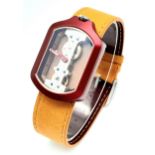 A Verticale Mechanical Top Winder Gents Watch. Brown leather strap. Ceramic red skeleton case -