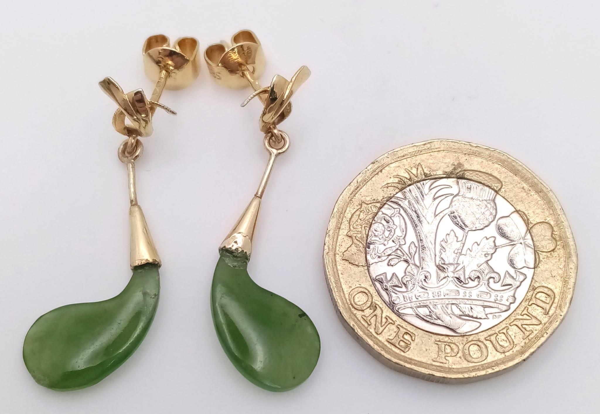 A Pair of 14K Yellow Gold and Jade Earrings. 2.4g total weight. - Image 4 of 5