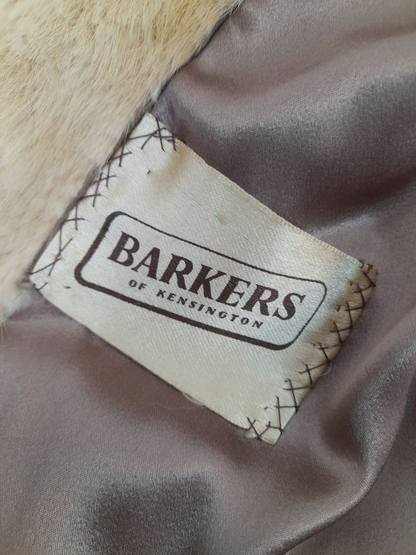 A Barkers of Kensington Three-Quarter Length White Fur Coat. - Image 7 of 8