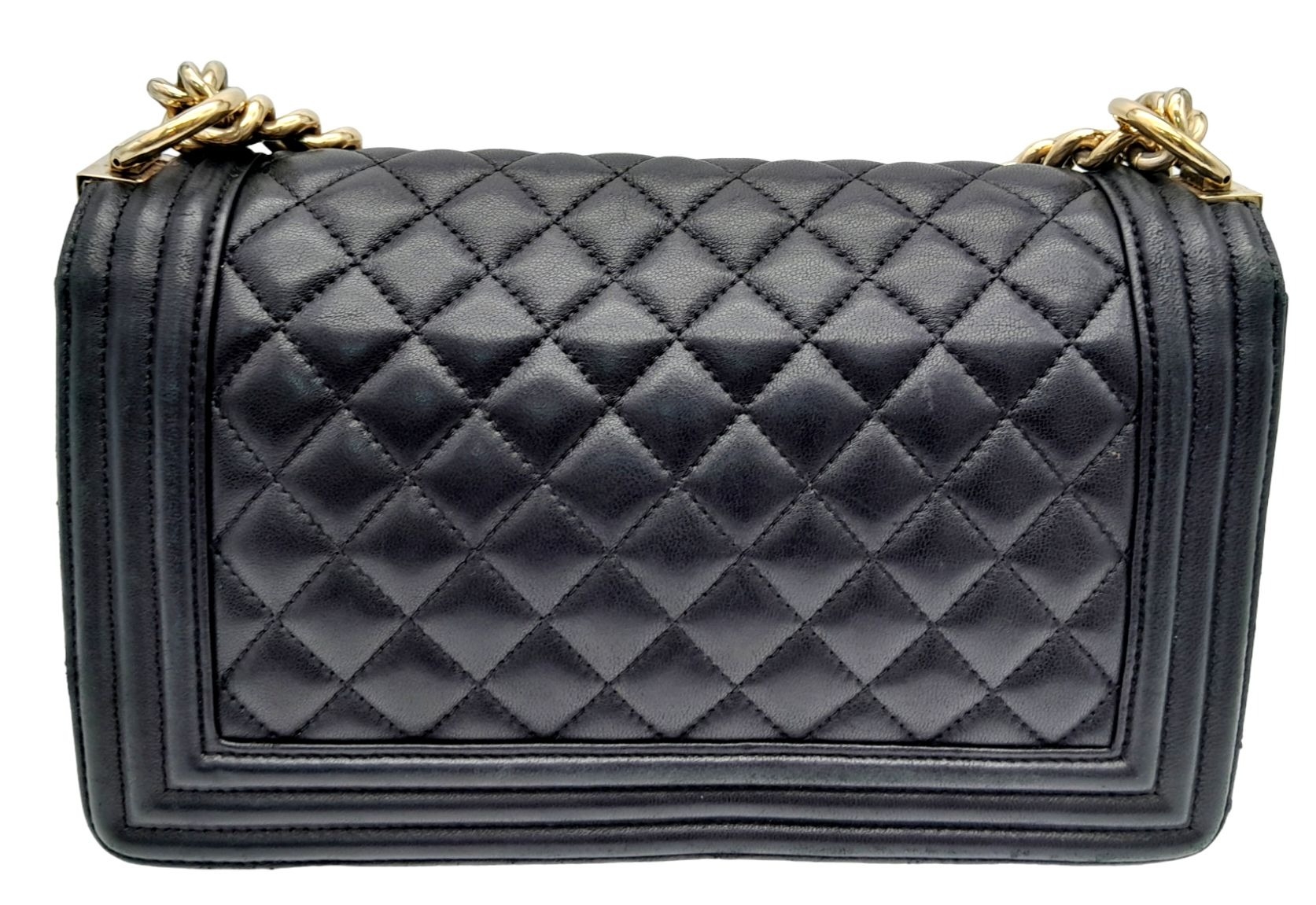 A Chanel Black Boy Bag. Quilted leather exterior with gold-toned hardware, chain and leather - Image 3 of 10