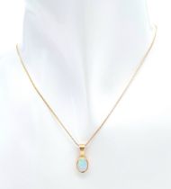 A 9k yellow gold opal pendant on 18 inch box chain 2.1g. approx 15mm x 7mm pendant. ref: TB03