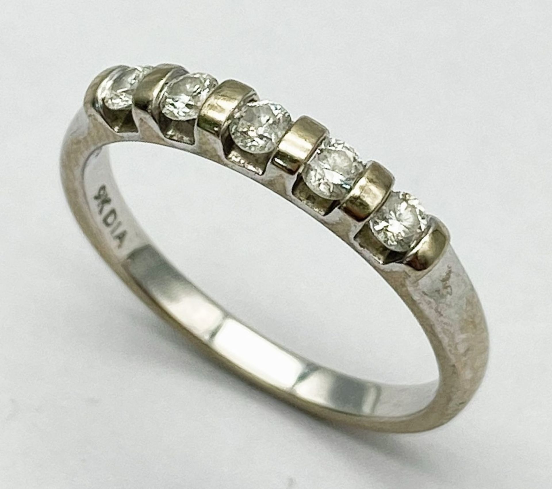 A 9K WHITE GOLD DIAMOND RING. 0.25ctw, Size L, 1.8g total weight. Ref: 8024