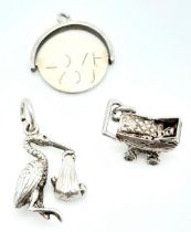 3 X STERLING SILVER NEW BABY THEMED CHARMS - PRAM, STALK CARRYING BABY, AND I LOVE YOU SPINNER. 4.4g