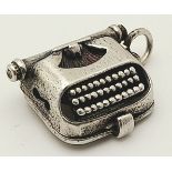 A STERLING SILVER TYPEWRITER CHARM. 1.9cm length, 3g weight. Ref: SC 8114