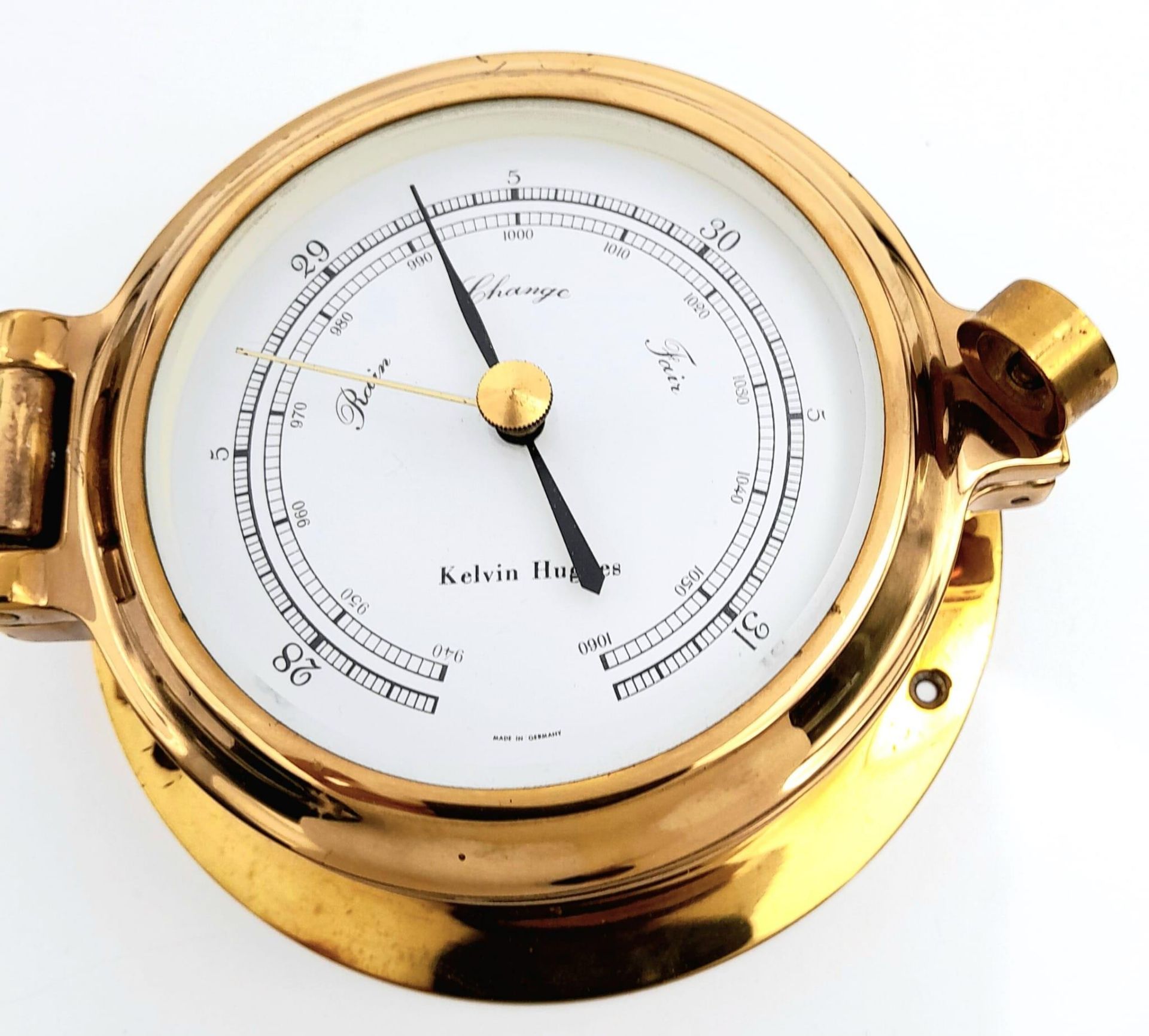 A Nautical, polished brass, KELVIN HUGHES barometer, having the shape of a ship-cabin’s porthole, - Bild 4 aus 7