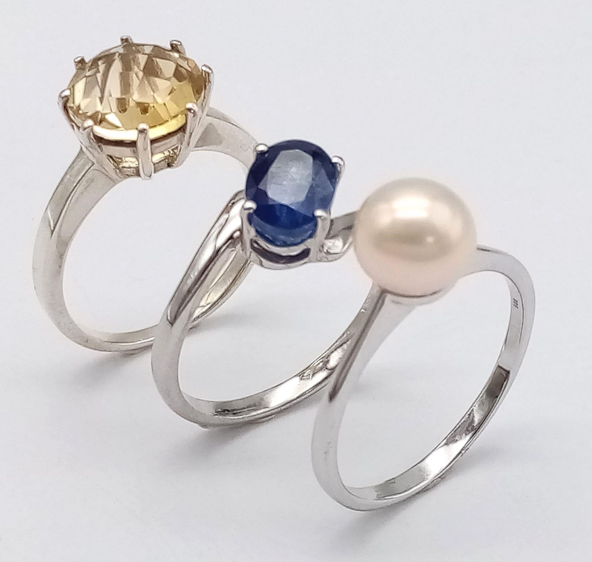 Three 925 Sterling Silver Gemstone Rings: Citrine- Size O, Sapphire - Size P and Cultured Pearl -