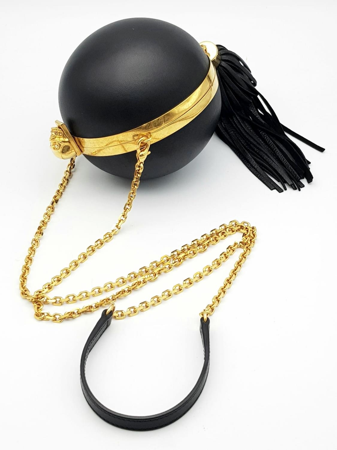 An Alexander Mcqueen Skull Ball Clutch Bag. Black leather exterior with gold tone hardware. - Image 2 of 6