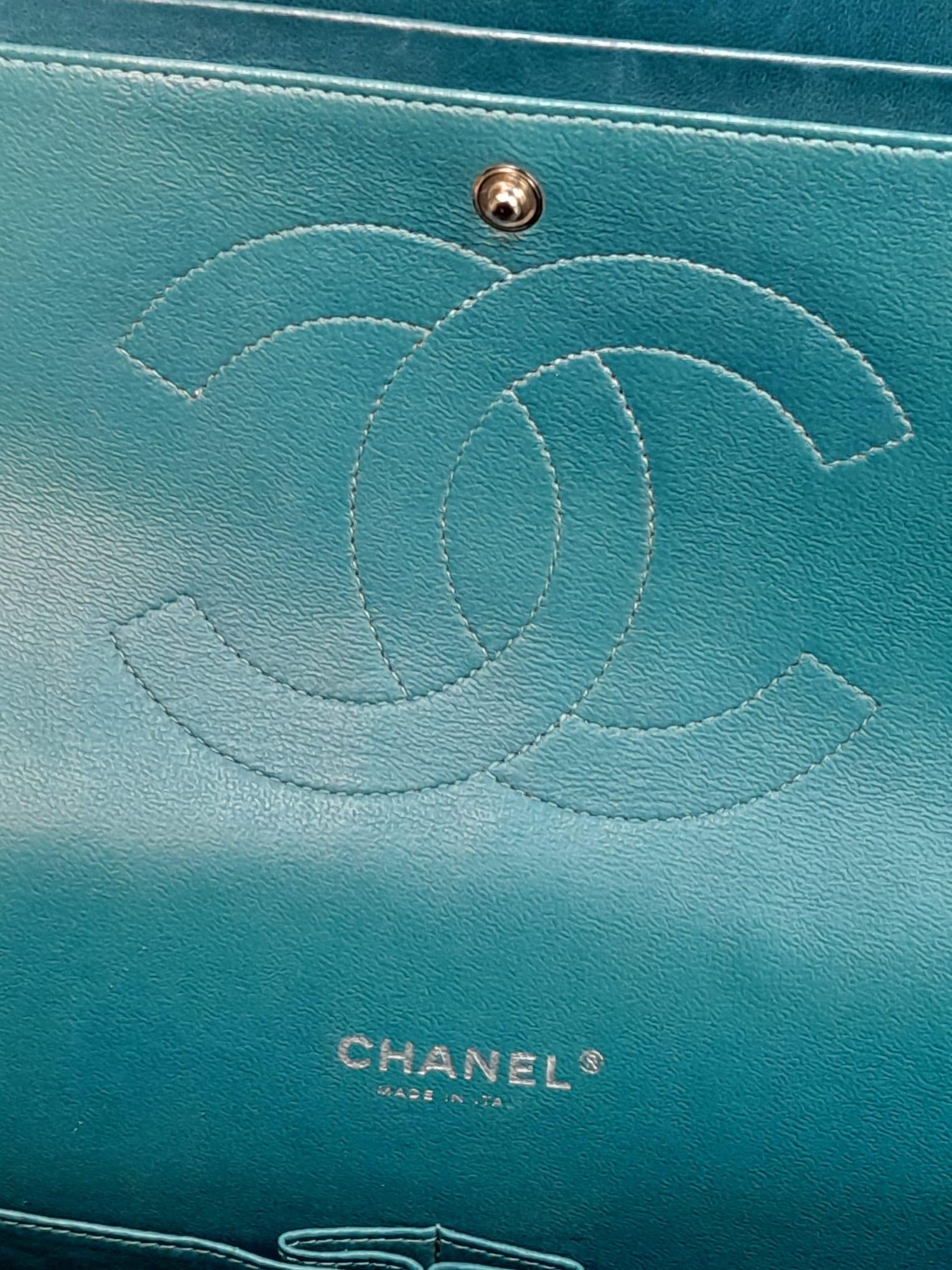 A Chanel Teal Jumbo Classic Double Flap Bag. Quilted leather exterior with silver-toned hardware, - Image 10 of 14