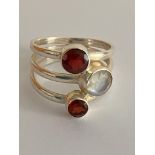 Vintage SILVER RING with ‘triple band’ design. Set with GARNETS and MOONSTONE.Full UK Hallmark.