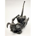 A collector’s item, not for the easily offended, a metal miniature statue of “Naughty Samantha,