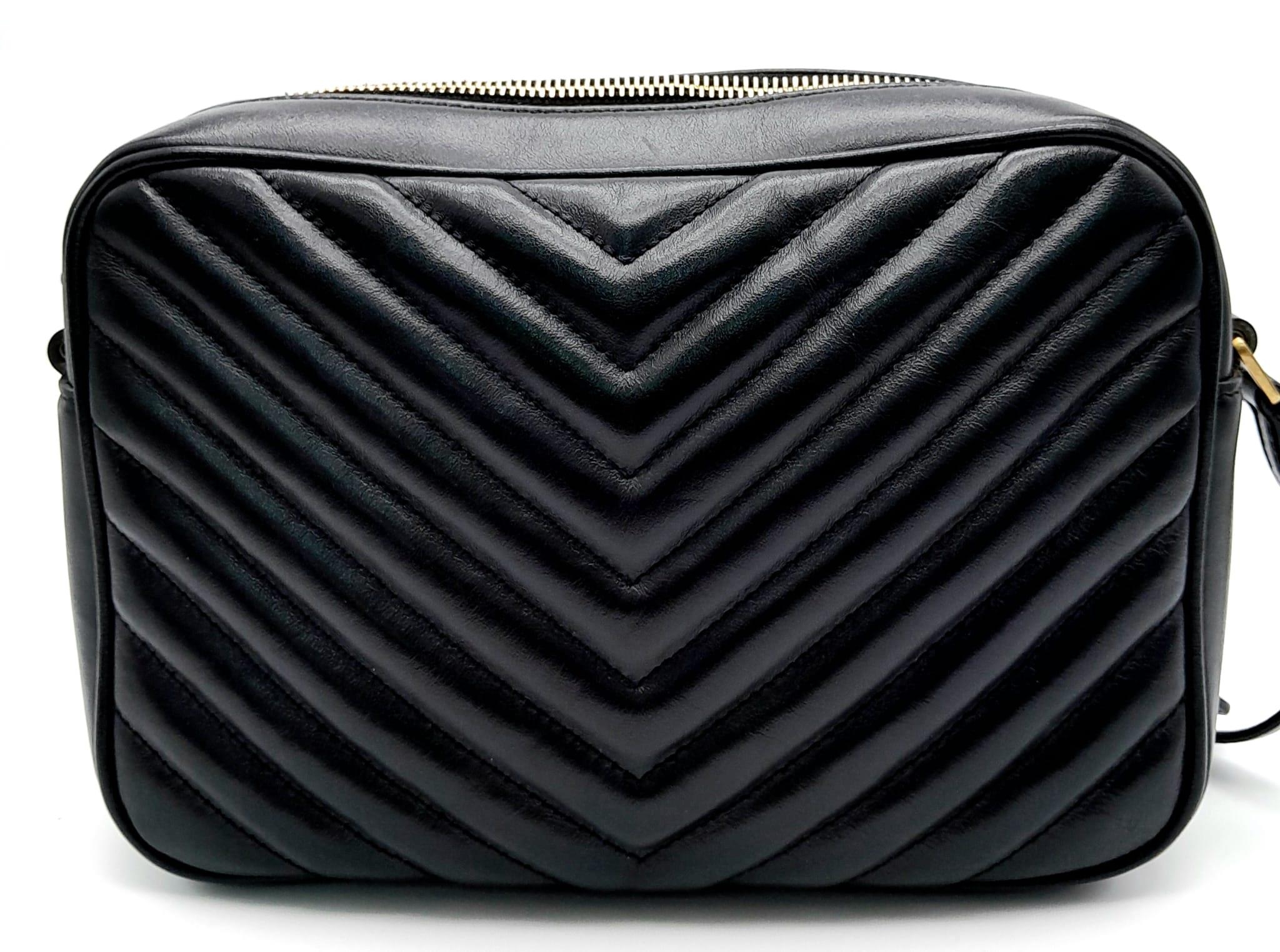 A YSL Saint Laurent Black Lou Matelasse Camera Bag. Leather exterior, gold-tone hardware, adjustable - Image 4 of 11