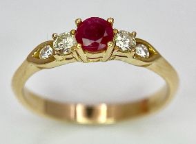 AN 18K YELLOW GOLD DIAMOND & RUBY RING. 0.20ctw, size O, 2.8g total weight. Ref: SC 8074