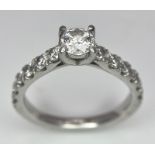 The Best Story - Is The Diamond Story. A 950 platinum diamond ring with a central SI1 0.40ct