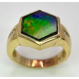 A Very Different, 14K Gold, Ammolite and Diamond Ring. Hexagonal shape. Size L. 6.3g total weight.