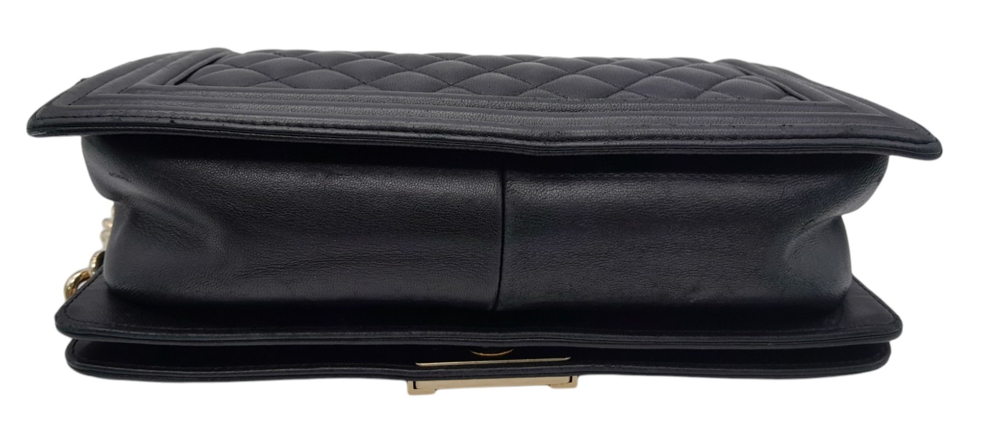 A Chanel Black Boy Bag. Quilted leather exterior with gold-toned hardware, chain and leather - Image 10 of 10