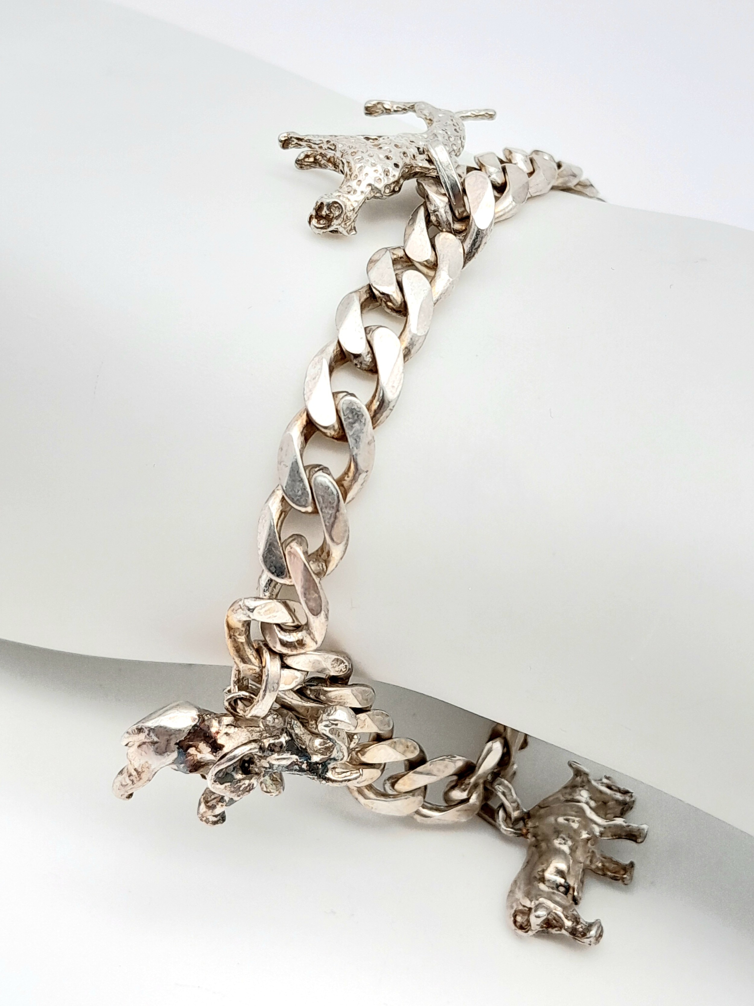 A LOVELY STARTER SILVER CHARM BRACELET WITH 5 ANIMAL CHARMS WAITING TO BE ADDED TO . 38.7gms - Image 3 of 4