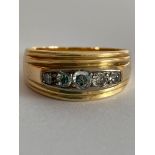 Impressive 14 carat GOLD RING having 5 x clear white DIAMONDS Beautifully mounted to top. 6.9 grams.
