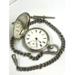 Antique gents silver full hunter pocket watch with chain . Ticks sold as found