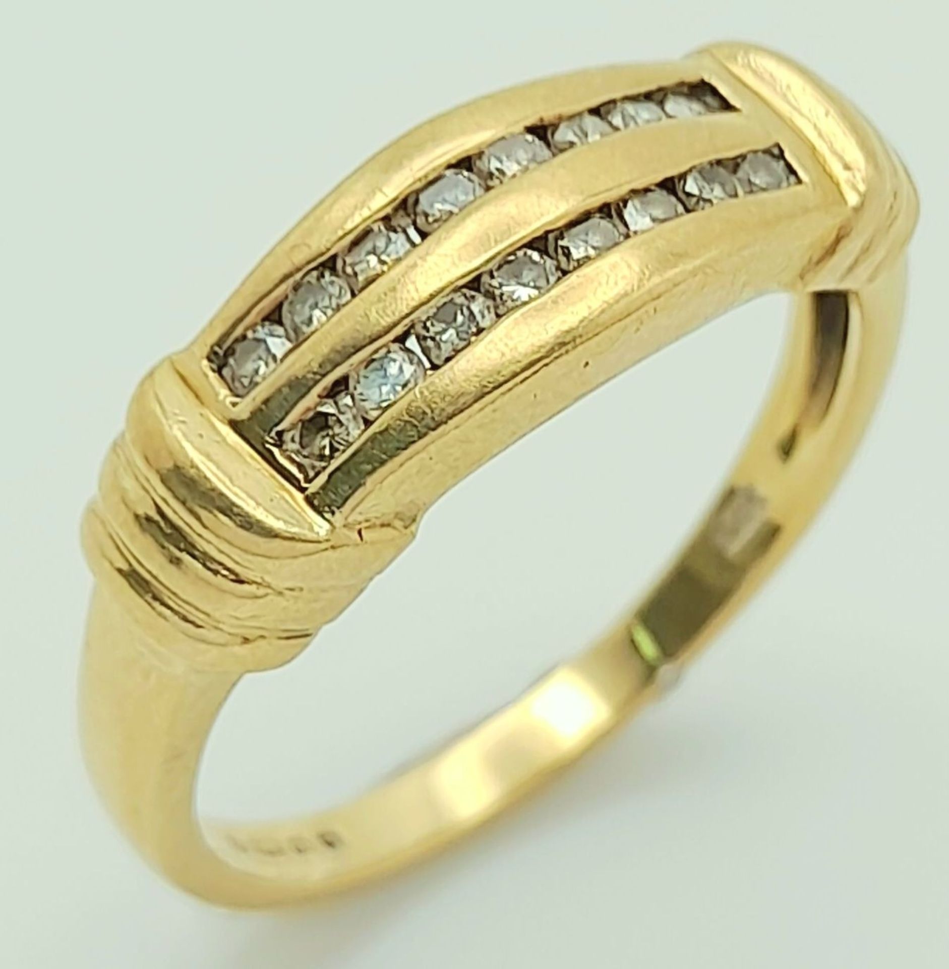 A 2003 Hallmarked 9K Gold Double Channel Set Diamond Ring. Size N. Set with Sixteen x 1mm Round