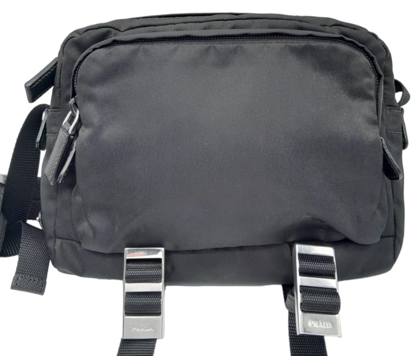 A Prada Black 'Tessuto Montagna' Crossbody Bag. Textile exterior with silver-toned hardware, a - Image 3 of 11