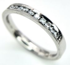 A PLATINUM DIAMOND HALF ETERNITY RING. 0.25ctw, size J, 4.1g total weight. Ref: SC 9078