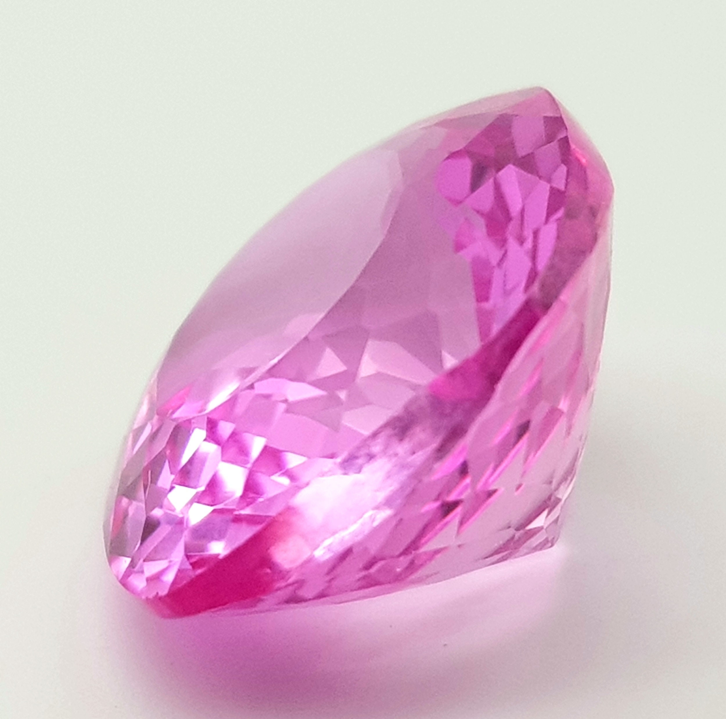 A Beautiful 21ct Pink Kunzite Gemstone. Cushion cut. Well faceted. No certificate so as found. - Image 2 of 4