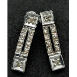 A pair of 10K White Gold Diamond Long Studs earrings, 0.12ct diamond weight, 4.1g total weight