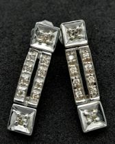 A pair of 10K White Gold Diamond Long Studs earrings, 0.12ct diamond weight, 4.1g total weight