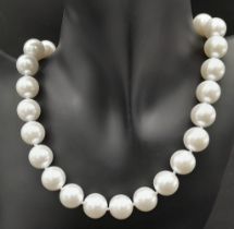 A Lovely Bright White South Sea Pearl Shell Bead Necklace. 14mm beads. 42cm necklace length.