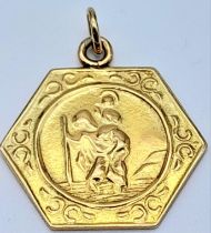 A 9K Yellow Gold St. Christopher Pendant. 2cm. 2.75g weight.