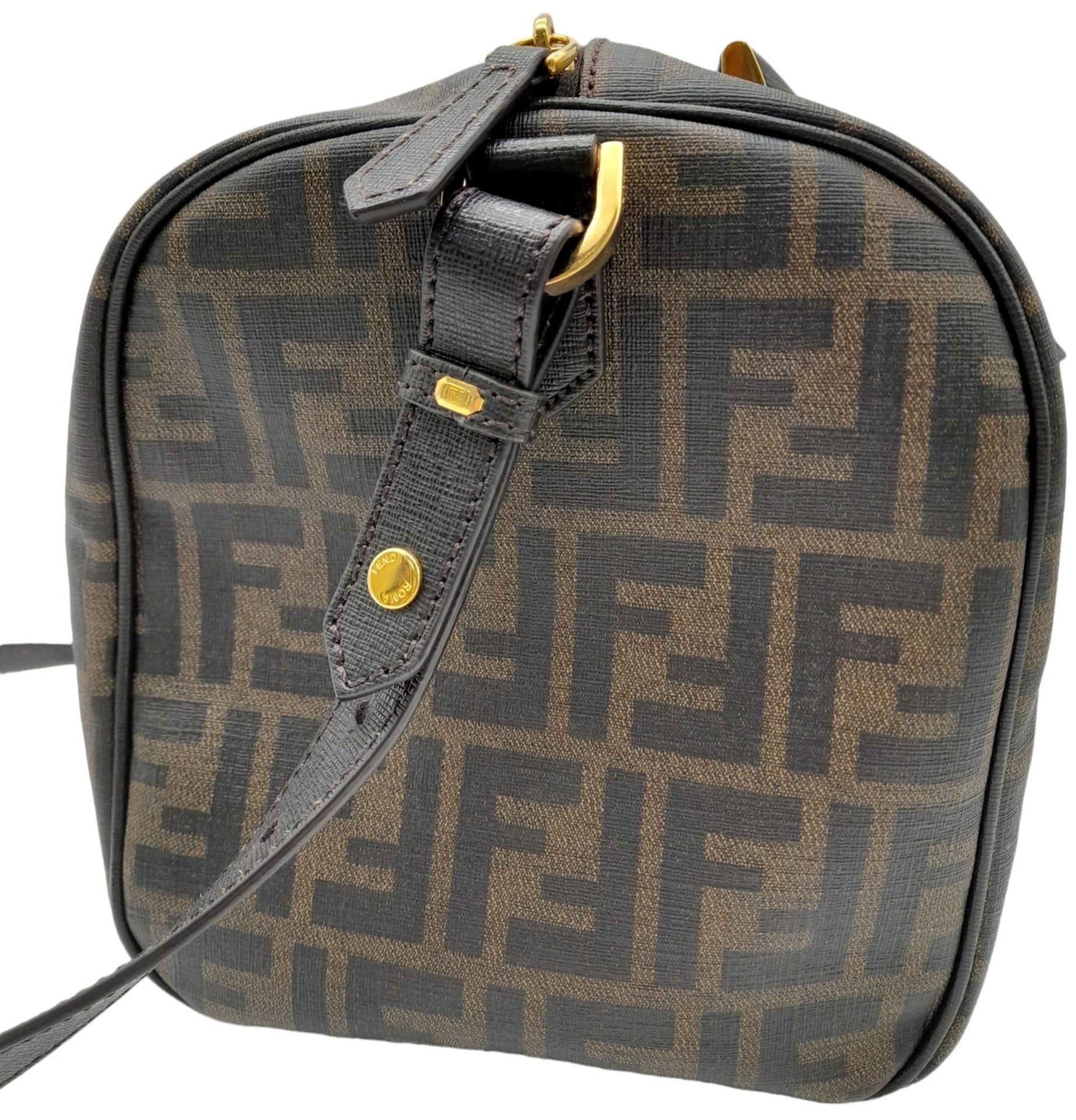 A Fendi Zucca Canvas Boston Bag. Canvas exterior, gold-tone hardware, adjustable strap, zipped top - Image 3 of 9