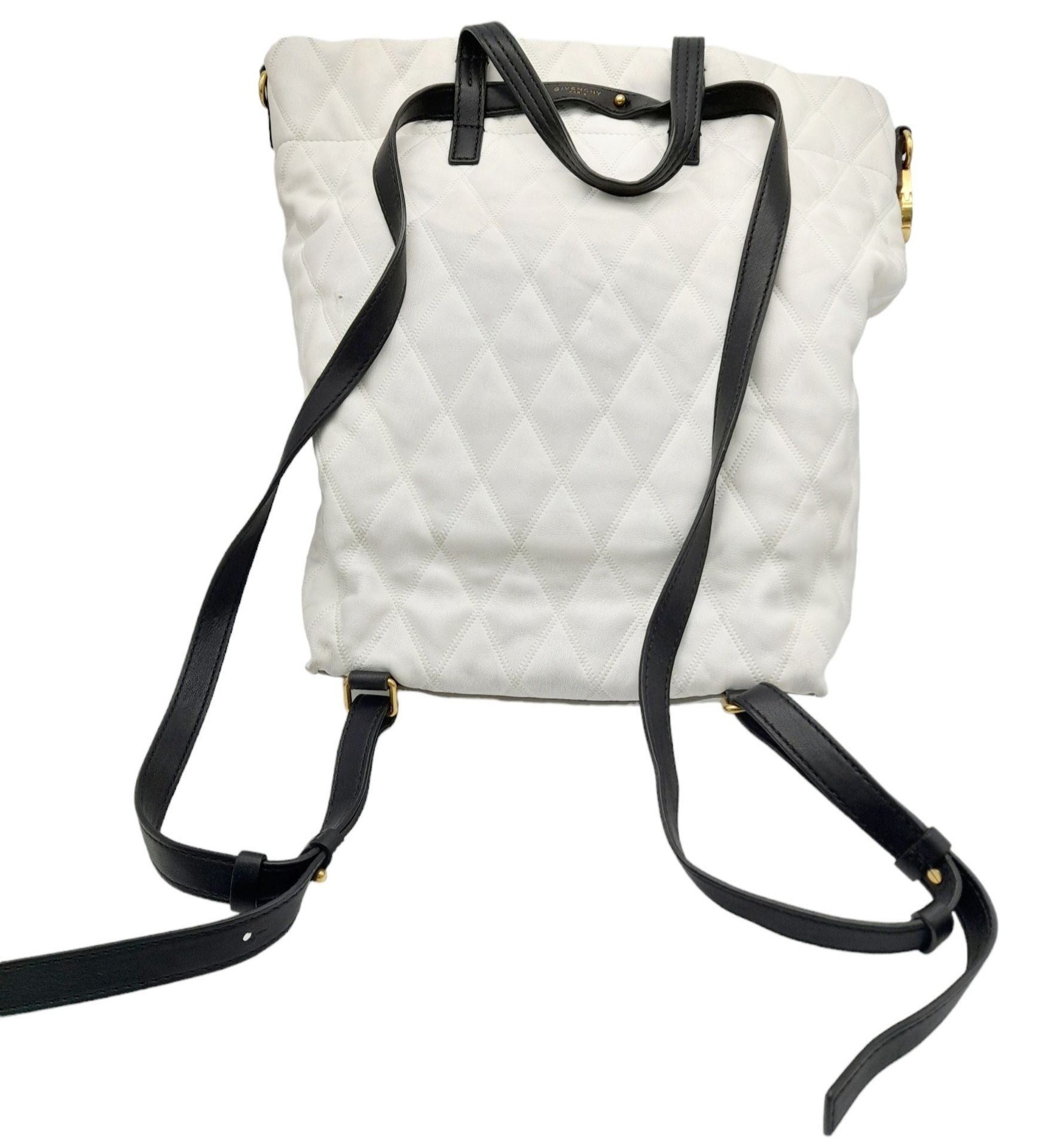 A Givenchy Black and White Duo Backpack. Quilted leather exterior with gold-toned hardware, a zipped - Image 2 of 10