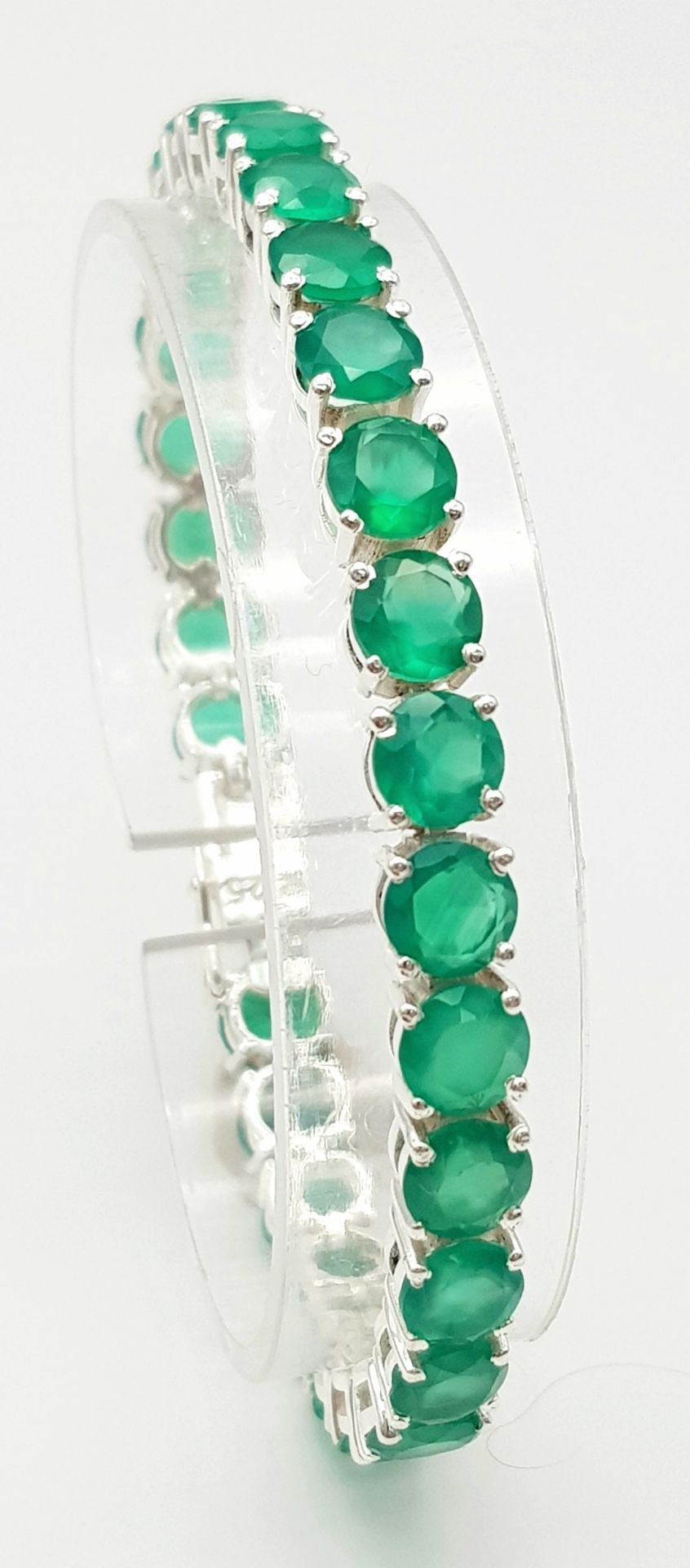A Green Onyx Tennis Bracelet set in 925 Silver. 18cm. 19g