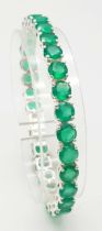 A Green Onyx Tennis Bracelet set in 925 Silver. 18cm. 19g