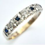 A 9K WHITE GOLD DIAMOND AND SAPPHIRE RING. 2.1G. SIZE O