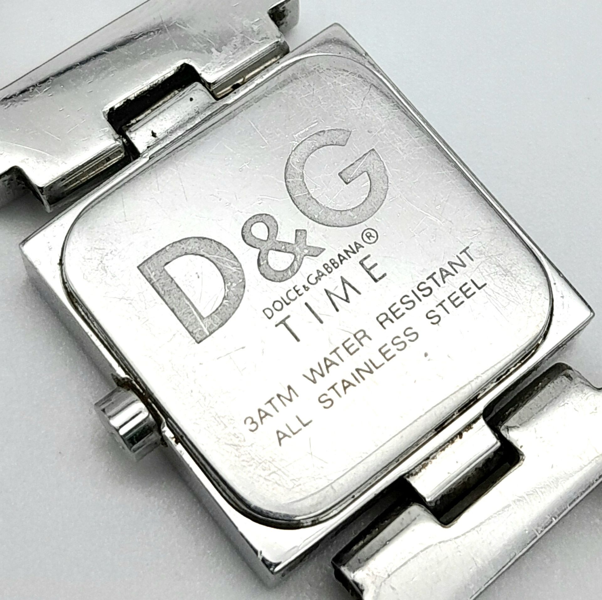 The very iconic ladies DOLCE & GABBANA watch with the D & G logo studded in Swarovski crystals. - Image 5 of 7