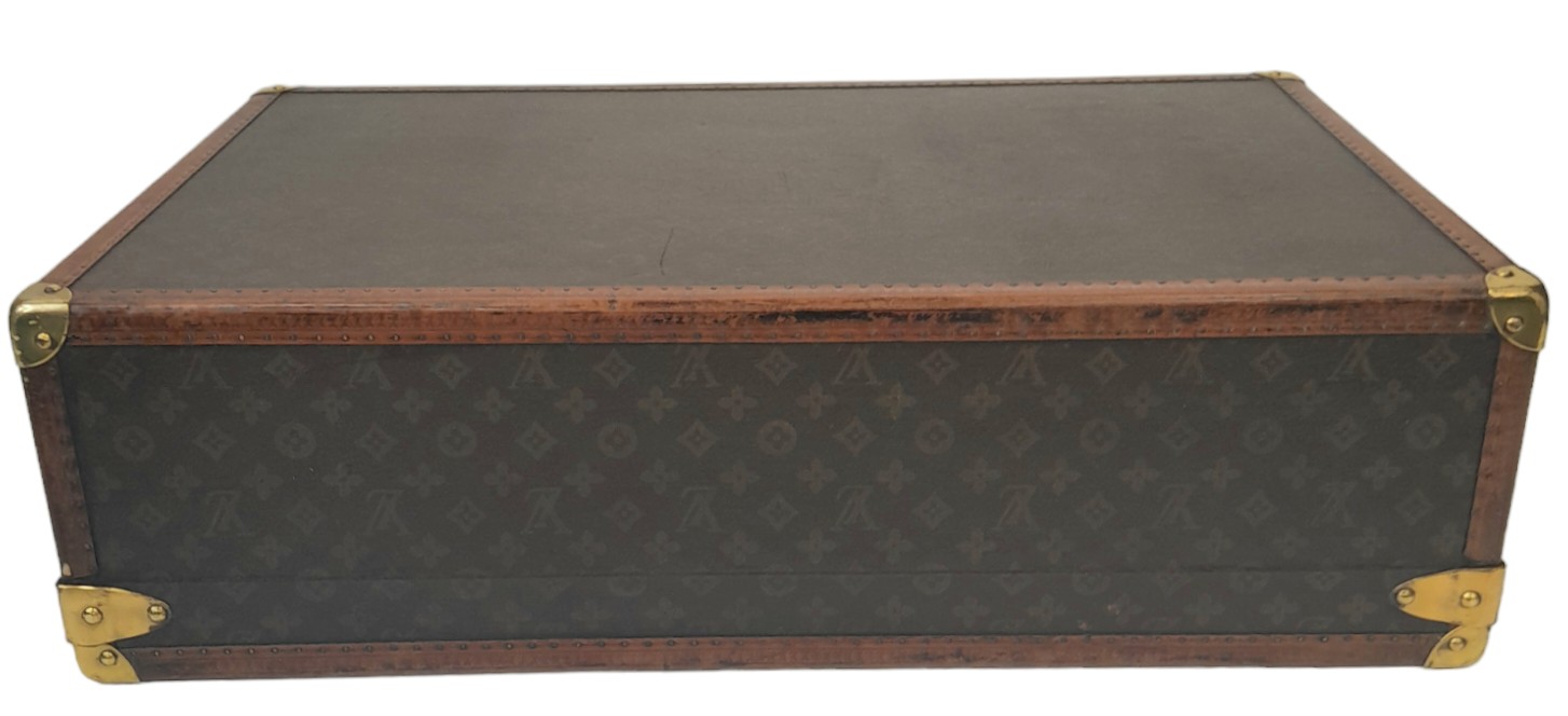 A Vintage Possibly Antique Louis Vuitton Trunk/Hard Suitcase. Canvas monogram LV exterior with - Image 12 of 15
